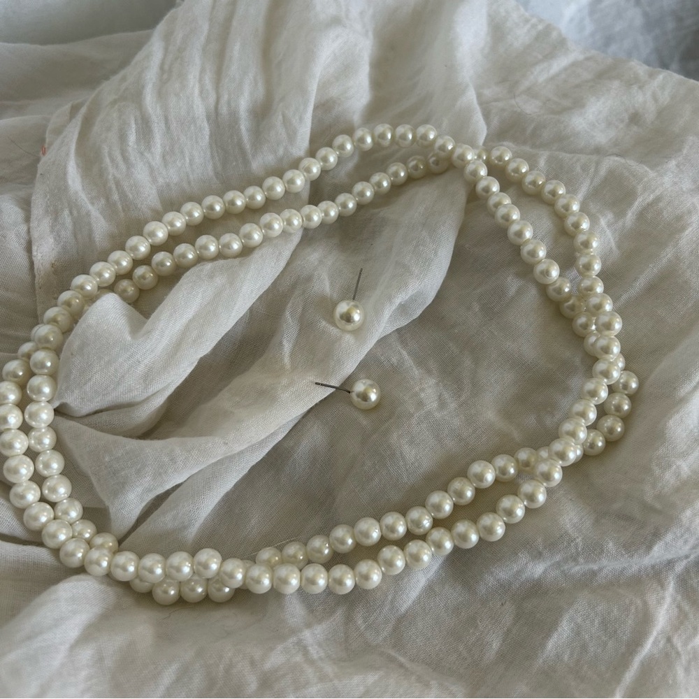 Pearl necklace, earrings, and bracelet